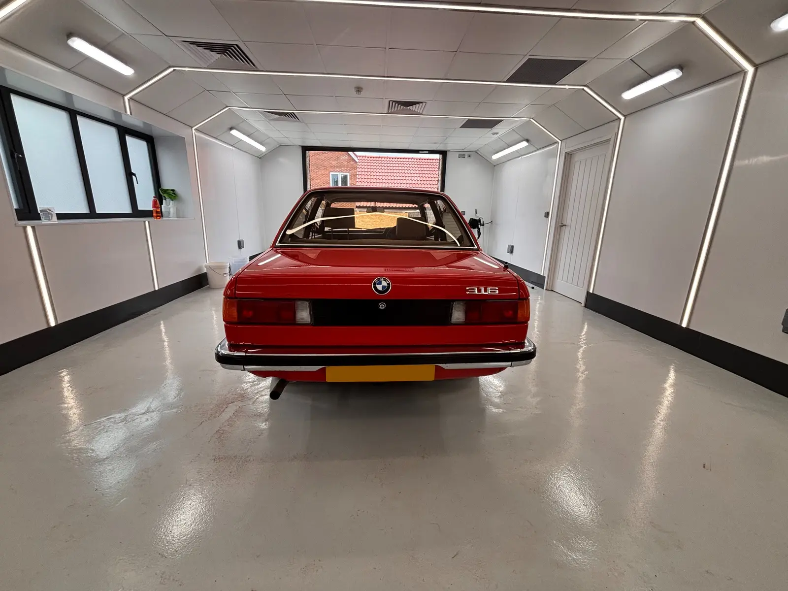 Rear view of the BMW E21 after professional cleaning